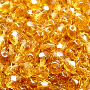 50ks České skleněné broušené ohňovky kulička 6mm topas