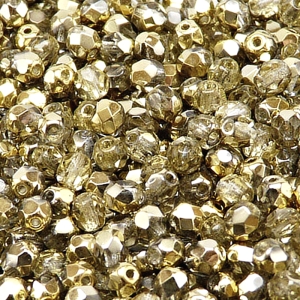 80ks České skleněné broušené ohňovky kulička 5mm čirá/ zlato polopokov