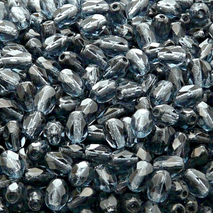 50ks České skleněné broušené tvarové ohňovky olivy 6x4mm montán safír